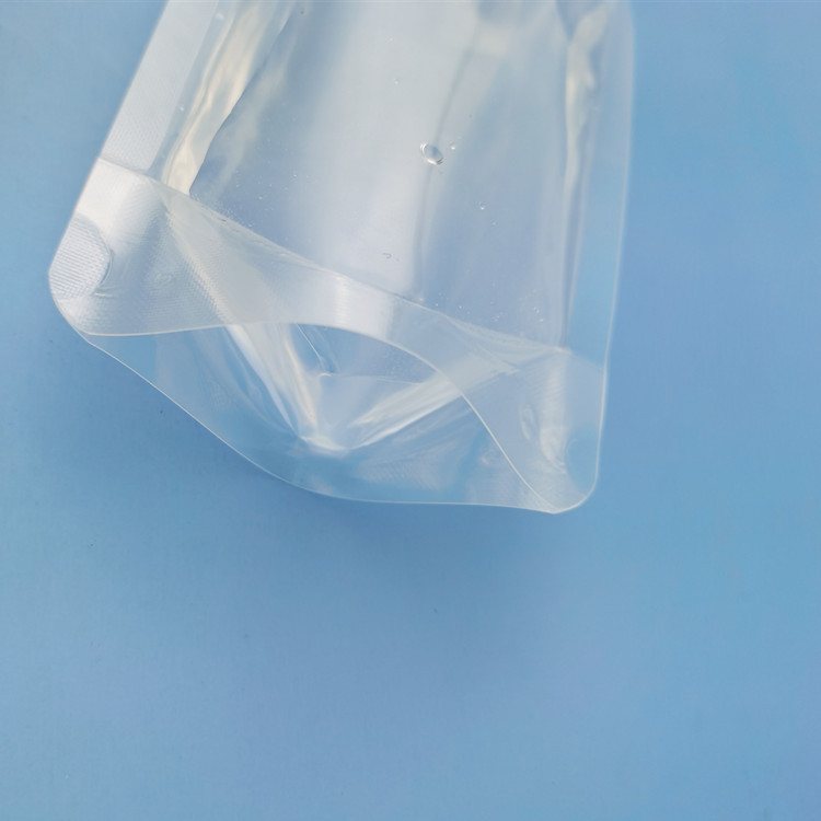 Injection-Moulded Pouch Fittings: Plastic Caps & Measuring Spoons, Colour-Matched and Supplied with Double Stand-Up Pouches for Food-Contact or Industrial Applications